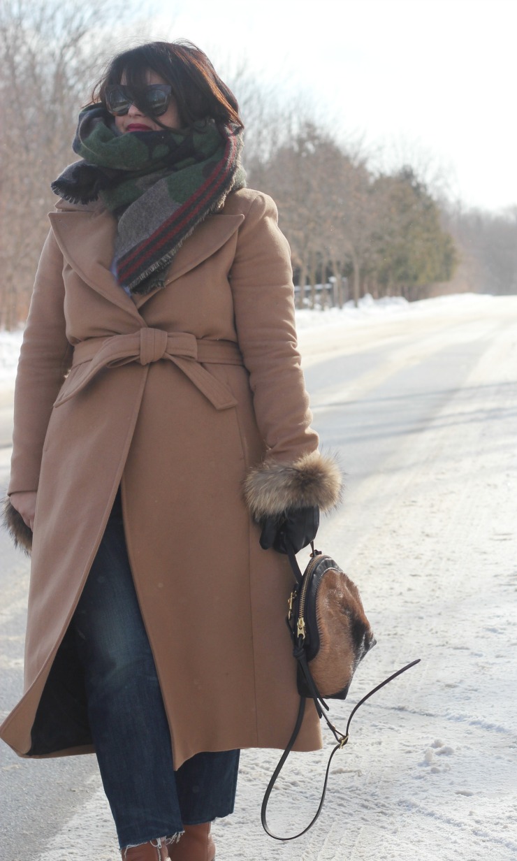 camel coat and camo scarf