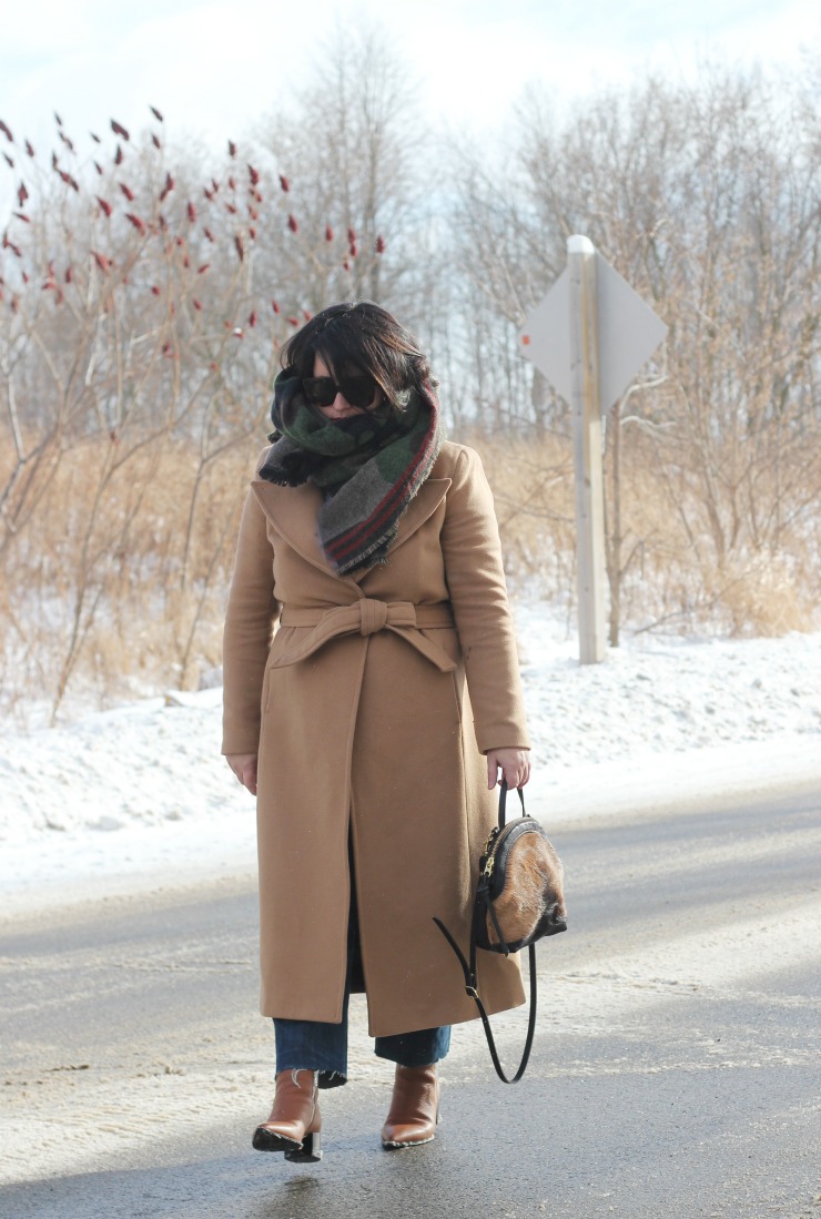 camel coat and camo scarf
