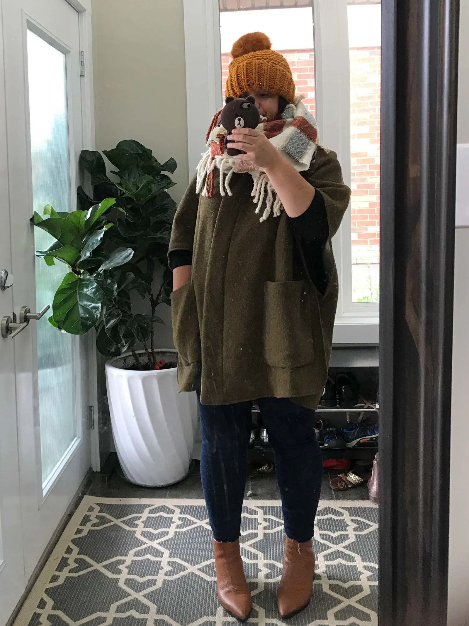 fall haul  with neutral plaid scarf and mustard pom hat