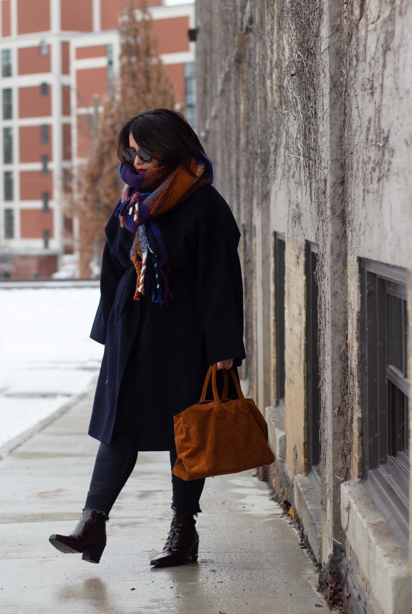 navy and brown outfit