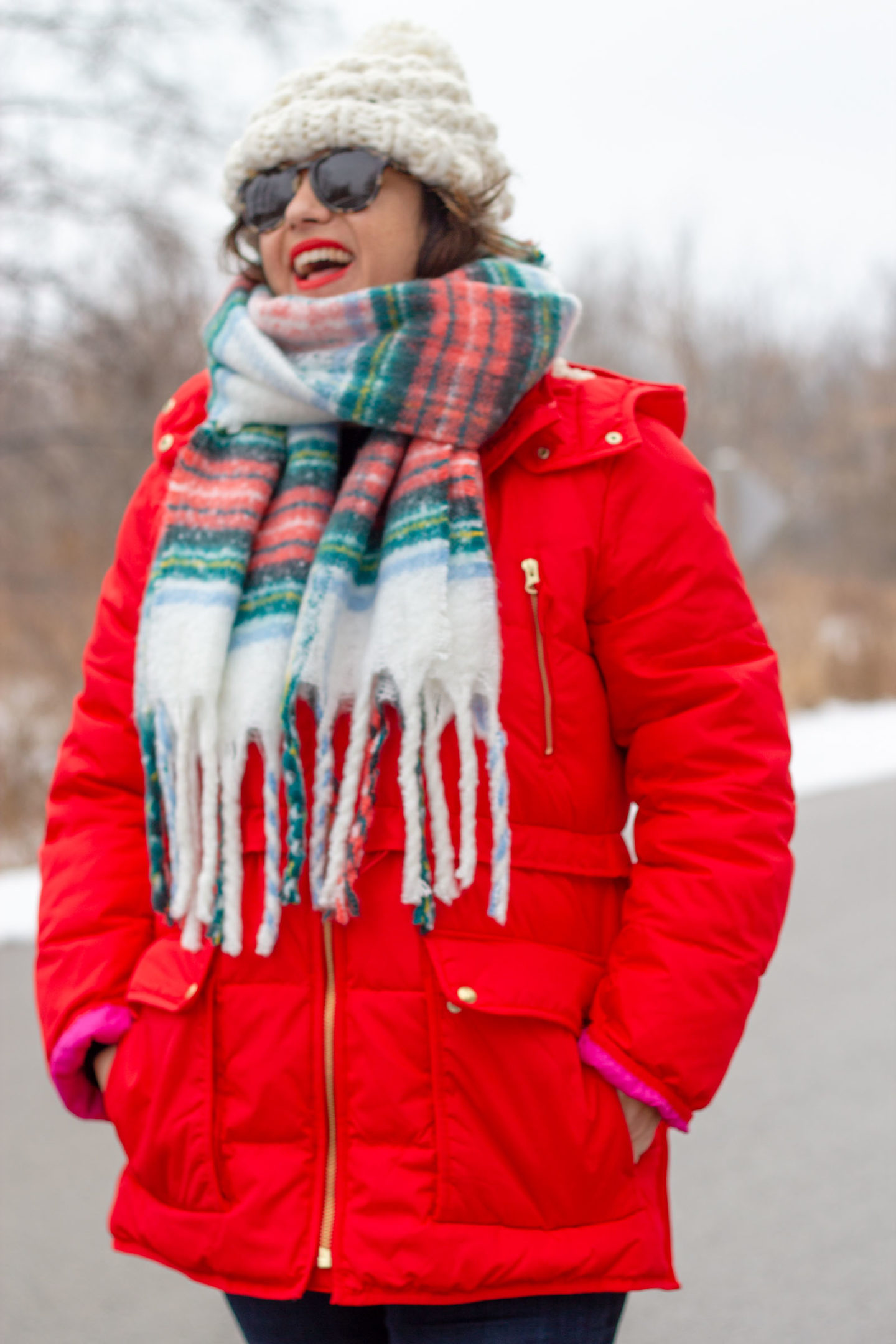 chateau puffer in red with plaid scarf