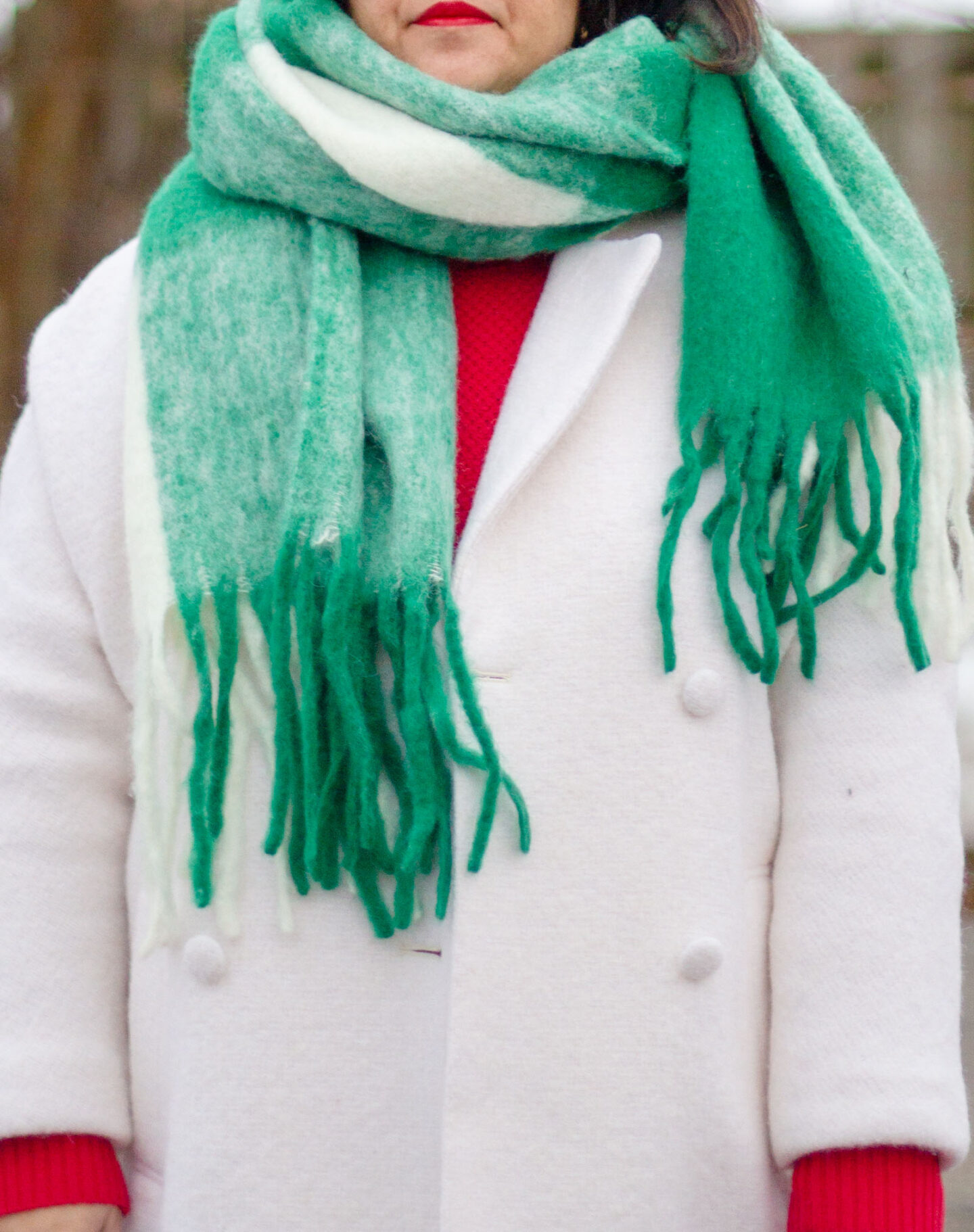 white coat with red and green accents