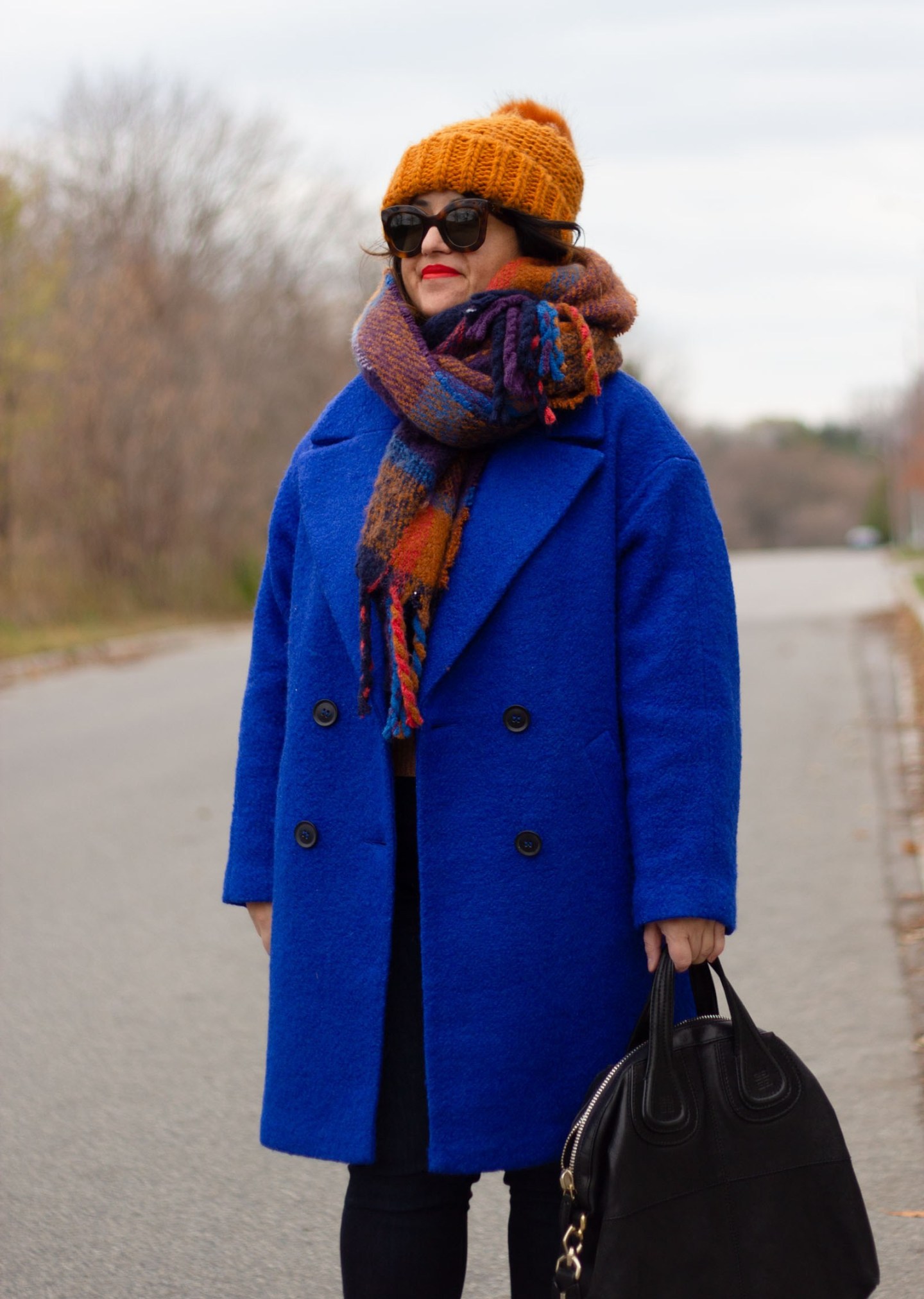 blue coat with brown scarf