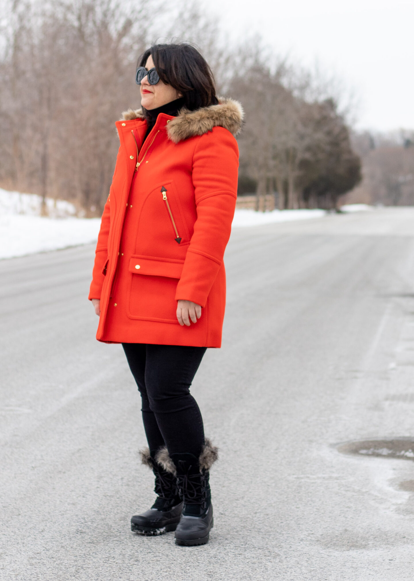 red jcrew coat, black outfit