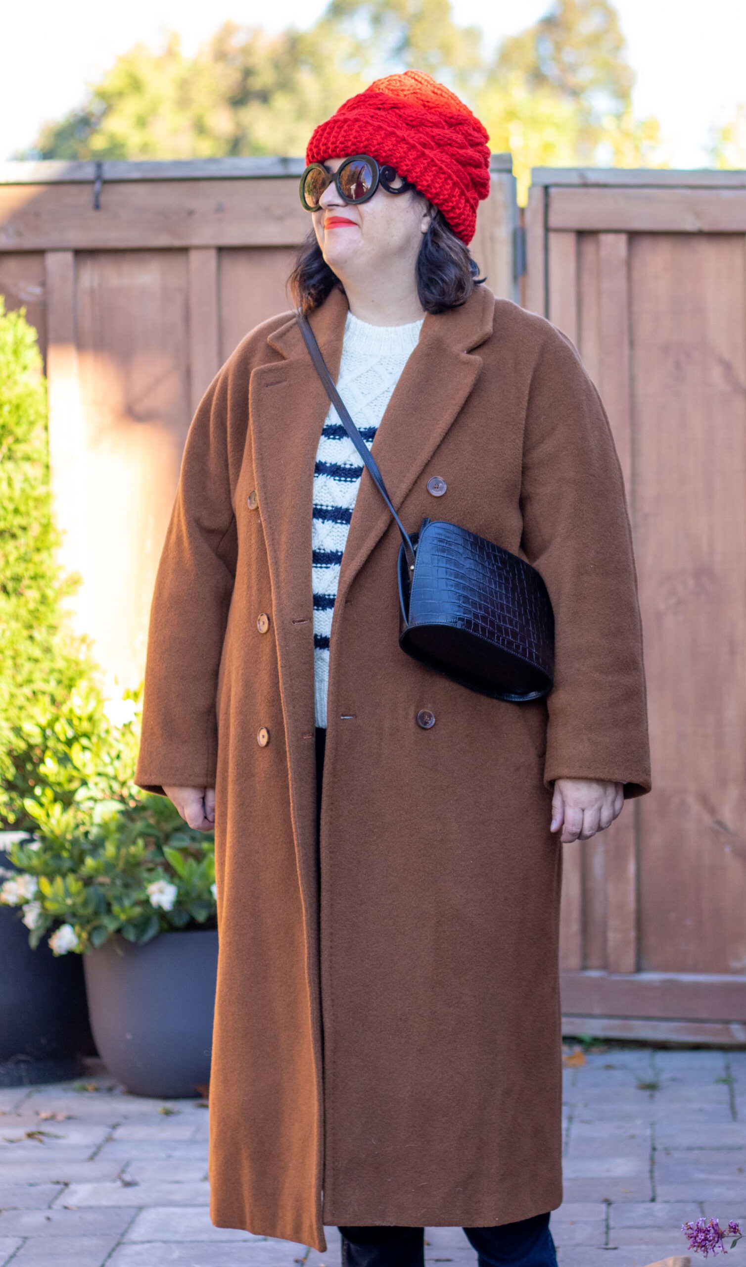 camel coat, sezane stripe sweater, red beanie