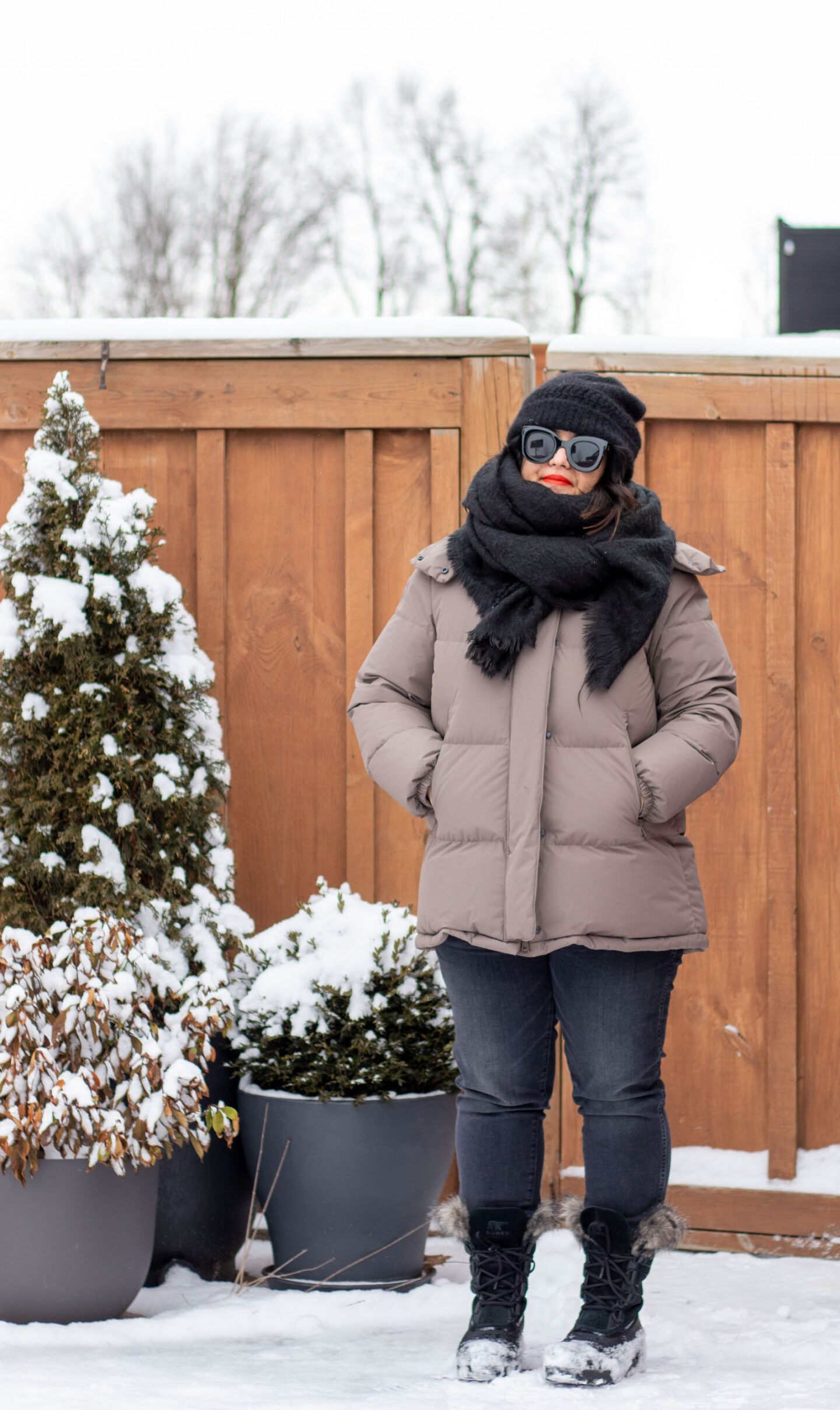 neutral coat with black scarf