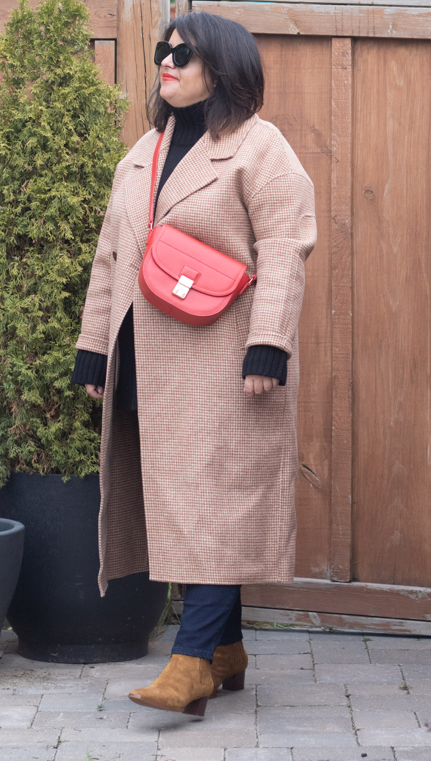 The Curated London coat, red bag