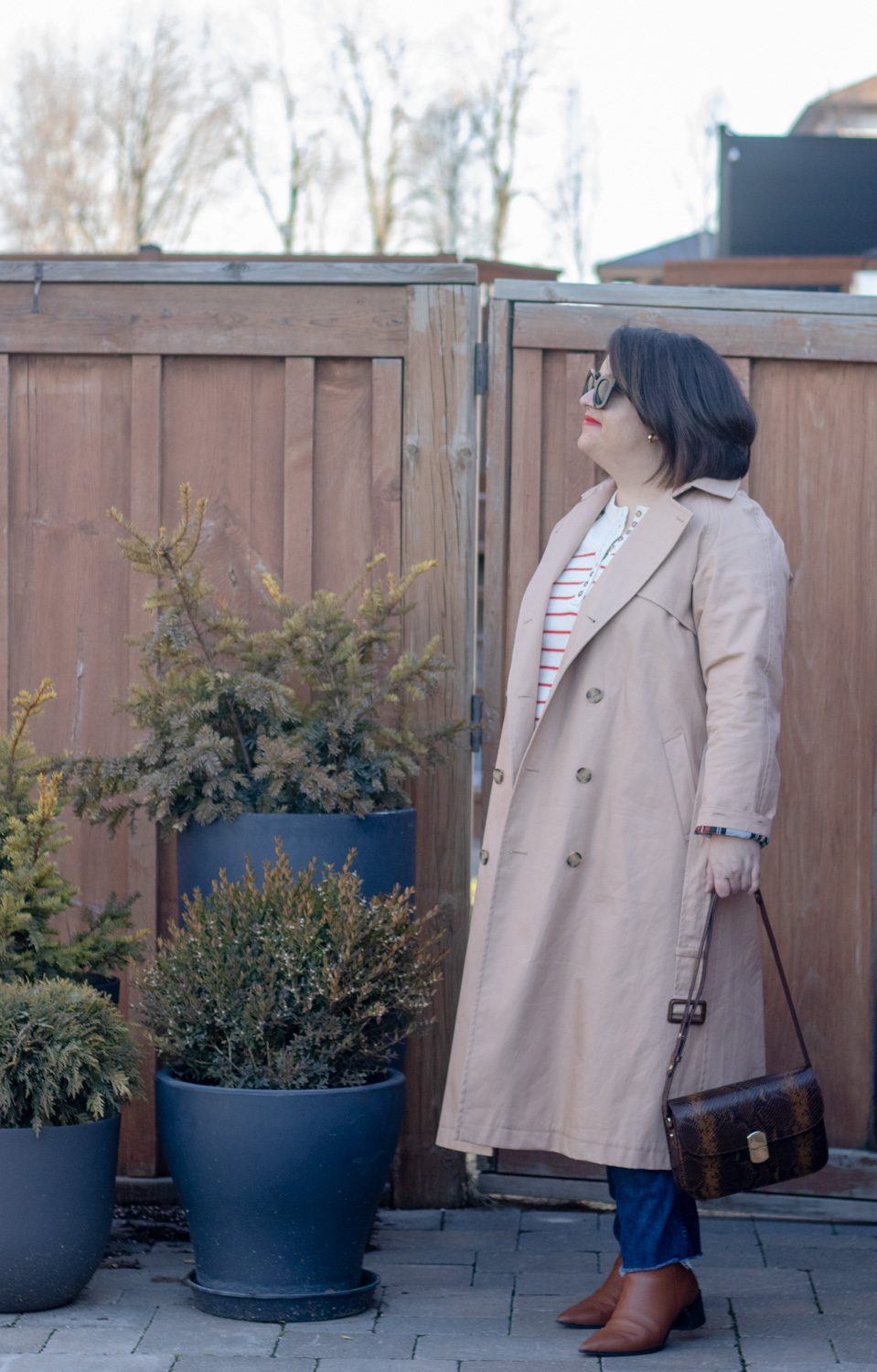 red stripe outfit and trench coat