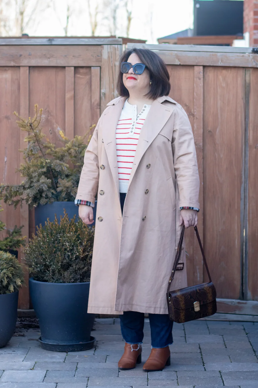 red stripe sweater and trench coat