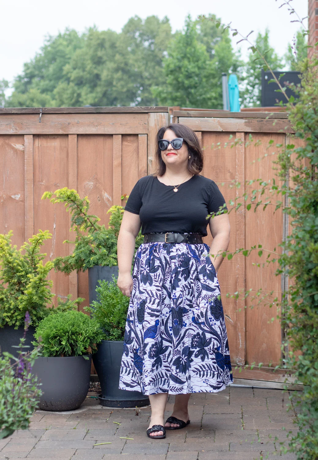 black top and printed skirt