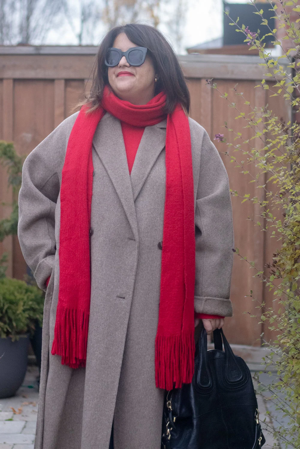 dark beige outfit with red scarf