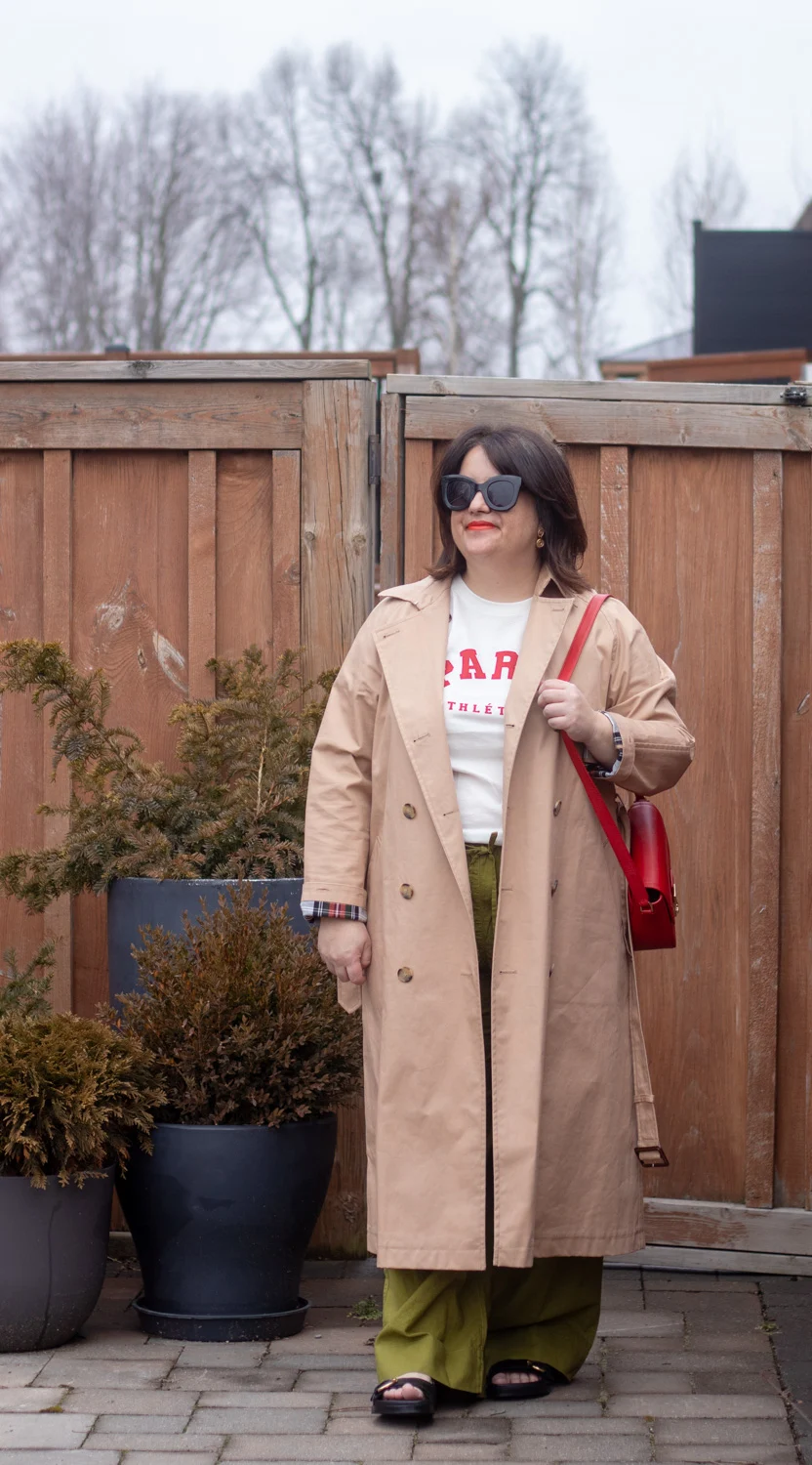 trench coat, green linen wide leg pants, paris tee, red bag