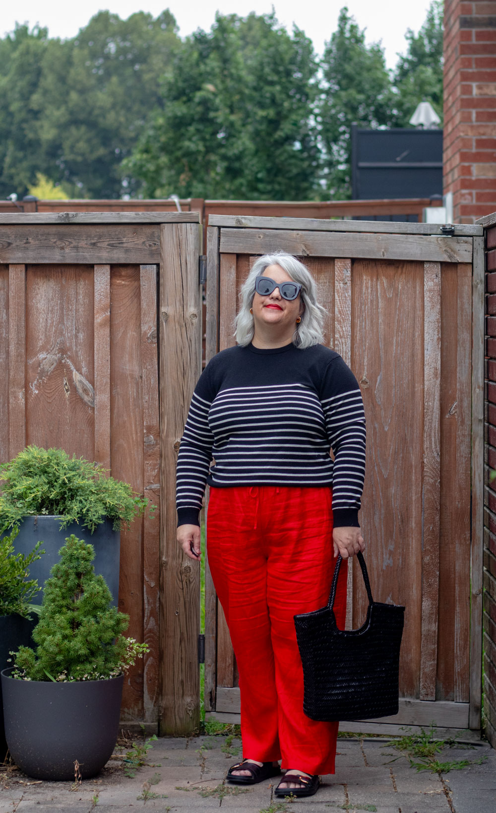 unbound merino crew sweater review, stripe sweater with red linen pants